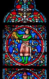 Colorful stained glass window in the Notre Dame Cathedral, UNESCO World Heritage Site in Paris, France