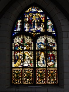 Medieval  stained glass window in Augsburg cCathedral, a romanesque basilica style Roman Catholic cathedral in Augsburg, Germany
