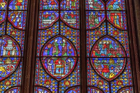 Detail of a stained glass window in Sainte-Chapelle , a royal chapel in the Gothic style, within the medieval Palais de la Cité , Paris