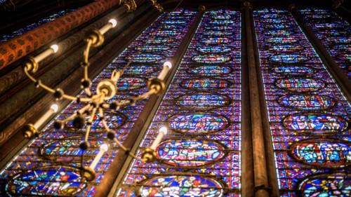 Paris, France-14 January, 2018: View interior of the famous Saint Chapelle, details of beautiful glass mosaic windows. Holy Chapel is a one of the mos