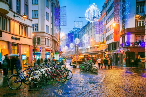 Strasbourg, France - December 2017: Street winter decorations in central Strasbourg at Le Gruber Restaurant during Christmas Market, Alsace.