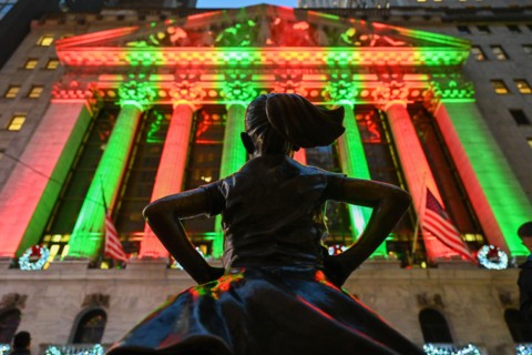 The Fearless Girl statue stands in front of the New York Stock Exchange (NYSE) on Wall Street on December 2, 2022 in New York.