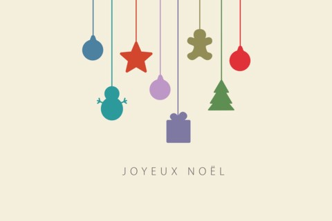 Greeting card with Merry Christmas lettering  in French (Joyeux Noël) and christmas decorations