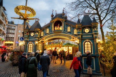 entrance portal to the christmas market heinzels wintermaerchen in the old town of cologne at dusk