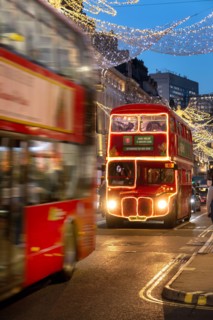 London bus covered in  Christmas lights in Regents Street Christmas 2024. Location  the West End of London