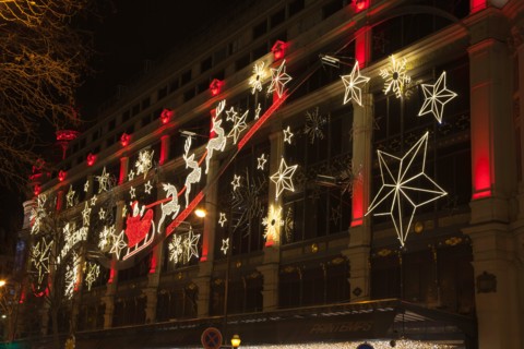 Christmas decorations on the exterior of Printemps department store, Paris, France
