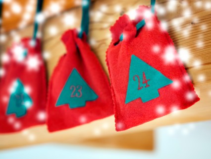 Picture of a Advent Calendar with the number 24 Christmas Eve with snow