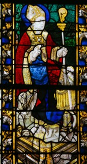 ROUEN, FRANCE - FEBRUARY 10, 2013: Saint Nicolas on a stained glass in the cathedral of Rouen, France