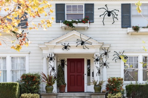 Halloween in front of house decorations