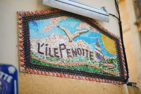 Beautiful art decorations made from shells and pebbles on walls in Ile Penotte, Les Sables d'0lonne of the department of Vendee, Pays de la Loire, Fra
