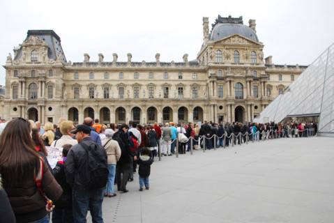 standing in line to enter the Paris Louvre, France