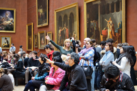 People viewing paintings, Musee du Louvre in Paris, France - Jan 2012