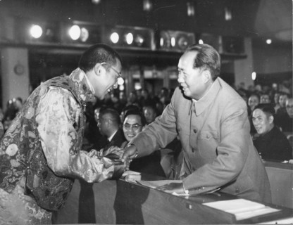 Scene at the First Session of the First National People's Congress. As Mao Tse-tung was announced Chairman of the People's Republic of China, the Dalai Lama, deputy of the Tibetan Region, greets him.