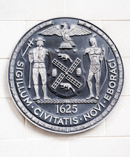 The seal of the City of New York on the side of a school in New York on Saturday, April 15, 2017. (© Richard B. Levine)