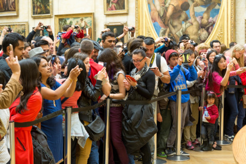 Crowd surrounding the Mona Lisa painting, Musee du Louvre, Paris, France