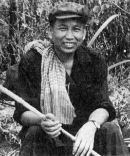 Cambodia: Saloth Sar, alias Pol Pot, in a 1979 DK propaganda photograph taken in western Cambodia.  In a posed propaganda photograph, Pol Pot, recently driven from power by the Vietnamese, sends a mes...