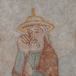 portrait of Saint Joseph, the husband of Mary, in a jewish hat, an ancient mural in Skibby church in Denmark, June 28, 2021