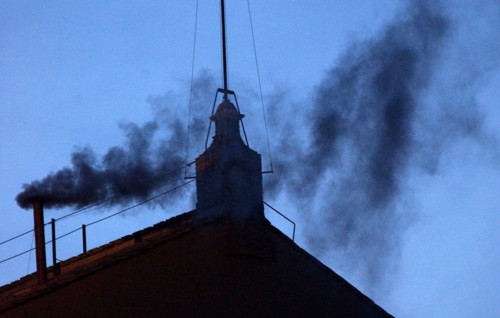 Apr 18, 2005; Vatican City, ITALY; Black smoke begins to rise from the chimney of the Sistine Chapel, signifying that no Pope has been chosen, in Vatican City in Rome, Italy on Monday, April 18, 2005....