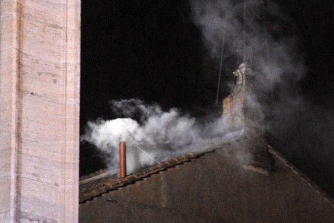 VATICAN CITY, VATICAN - MARCH 13: White smoke is seen from the roof of the Sistine Chapel indicating that the College of Cardinals have elected a new Pope on March 13, 2013 in Vatican City, Vatican. P...