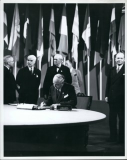 Jun. 06, 1945 - The San Fransisco Conference Arthur H Vandenberg, Untied States Senate, member of the Delegation from the Untied Sttes, signing the United Nations Charter, 26 June 1945