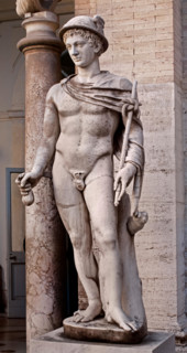 Hermes Ingenui  Hermes wears his usual attributes: kerykeion (or herald's staff), kithara, petasus (round hat), traveller's cloak and winged temples. Marble, Roman copy of the 2nd century BC after a G...