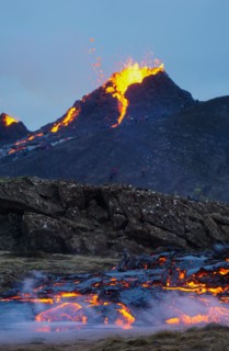Molten lava flowing from a small volcanic eruption in Mt Fagradalsfjall, near the capital of Reykjavik, Southwest Iceland, in March 2021.