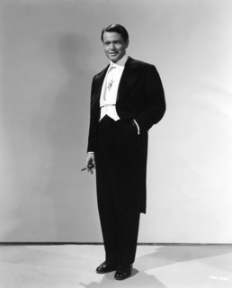 ORSON WELLES Portrait as a Magician in his Mercury Wonder Show in FOLLOW THE BOYS 1944 director A. EDWARD SUTHERLAND producer Charles K. Feldman gowns Vera West Universal Pictures