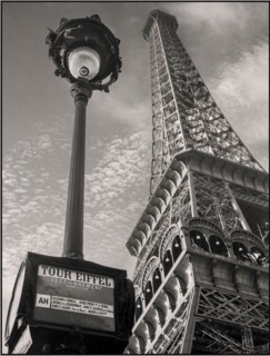 Vintage 1930s Eiffel Tower and a bus stop "Tour Eiffel" Paris France B&W retro vintage iconic cityscape 1935 Location : France, Paris Photographer  Willem van de Poll,