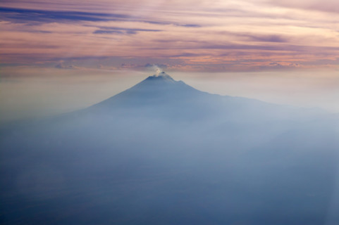 Popocatepetl volcano in Mexico DF city aerial view from aircraft