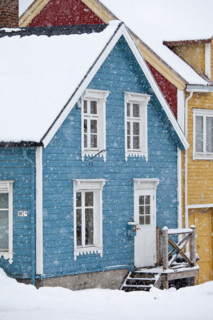 Quaint traditional architecture wooden buildings along Storgata in city of Tromso, in the Arctic Circle in Northern Norway