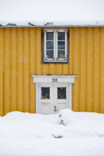 Traditional wooden buildings along Storgata in the quaint area of Tromso, in the Arctic Circle in Northern Norway