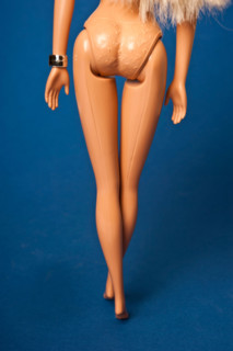 Barbie doll naked, legs and buttock