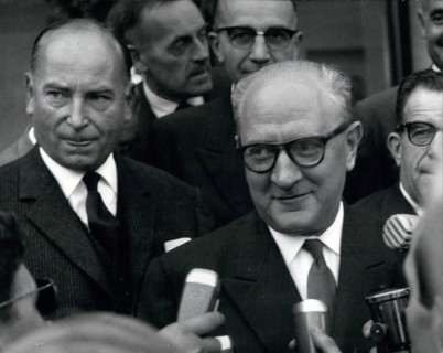 Sep. 09, 1951 - General Secretary of French Section of the Workers' International (SFIO) Guy Mollet is pictured being interviewed by journalists. Mr. Leenhart, who is on the left, is President of the ...