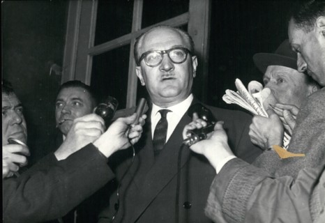 May 05, 1958 - Guy Mollet, who talked with Pierre Pflimlin, announced that he will accept the position of Council Vice-President. He is pictured making his announcement to the press. Germany - Policem...
