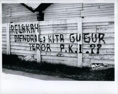 Oct. 10, 1965 - Indonesia: Djakarta - fence in city after aborted communist coup of Oct. 1, 1965, says that communist party is traitor to the Indonesian revolution and charges terror tactics. These si...
