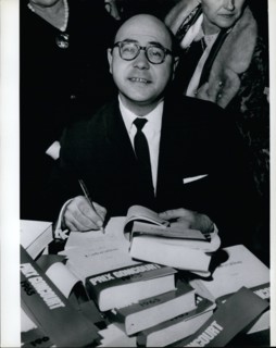 Nov. 11, 1965 - Jacques Borel: Winner of the Goncourt Literary Prize for his book ''Adoration'' -signing his book. (He is English teacher in a Paris school)