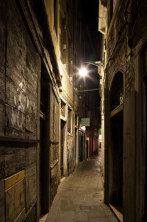 Venice, Italy. narrow street or 'calle' at night