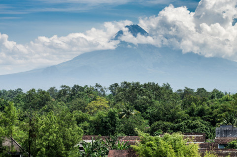 View of Gunung Merapi volcano from central Yogyakarta - Java, Indonesia