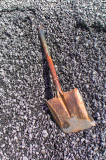 Gravel and shovel  to creative texture and pattern for design and decoration isolate on background.Copy space.