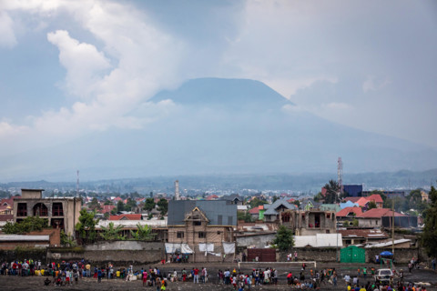 The city of Goma, Democratic Republic of Congo, with Nyiragongo volcano in the distance