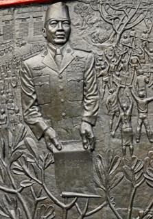 jakarta, dki jakarta/indonesia - april 20, 2009: detail of the relief at pancasila sakti  memorial site, sukarno holding spersemar