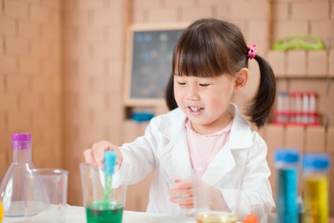 young  girl  play science experiments for homeschooling