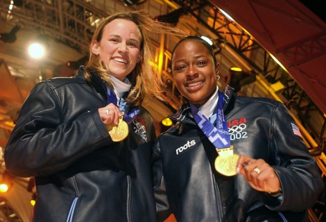 The first winners in the 2002 OLYMPIC WINTER GAMES debut for womens two-man bobsledding. World Class Athlete SPECIALIST Jill Bakken, USA, left, and Vonetta Flowers, of "USA-2" bobsled, show off their ...