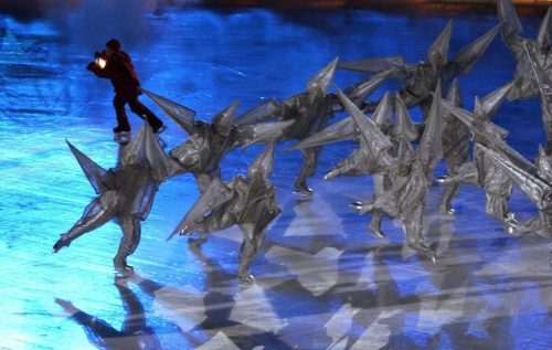 OT.135211.- - DELIVER TO:.sports.- -.2/8/2002.- -.Salt Lake City.- -.Opening Ceremonies of the XIX Winter Olympic Games at Rice-Eccles Stadium in Salt Lake City The Child of Light skates during openin...