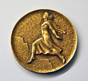 This medal from the 1948 Winter Olympics in St. Moritz was created by Huguénin. It commemorates the winter sports competition held in Switzerland during the post-war period.