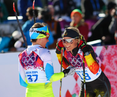 Sochi, RUSSIA – February 8, 2014: Claudia NYSTAD (GER) (R) at the finish of ladies' Skiathlon 7.5 km Classic + 7.5 km Free