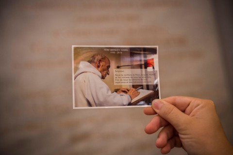 A picture of Father Jacques Hamel - Saint Bartholomew's church, Rome, Italy.