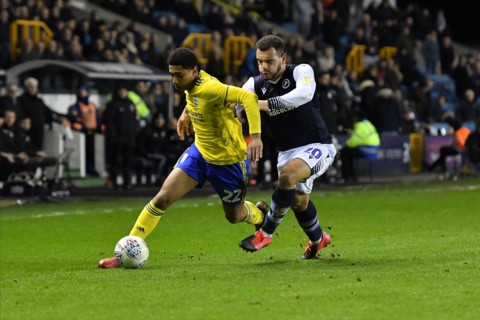 LONDON, ENGLAND - FEBRUARY 26TH Jude Bellingham of Birmingham battles for possession with Mason Bennett of Millwall during the Sky Bet Championship match between Millwall and Birmingham City at The De...