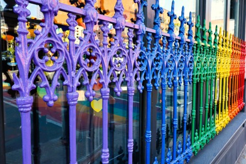 Rod Iron fence painted in pride colors