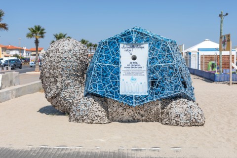 A plastic bottle recycling collection tortoise in Barcares, France